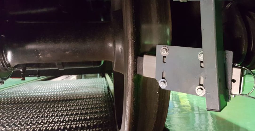 Wheel flange stick lubrication